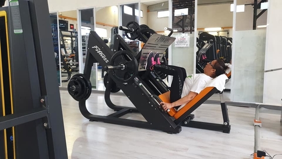 Appareil de pressage pour les jambes avec charge moyenne et sélection de la charge des broches