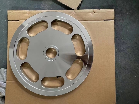 Une barre d'entraînement en force avec un ensemble de plaques de poids et une barre en argent de plaque de chrome